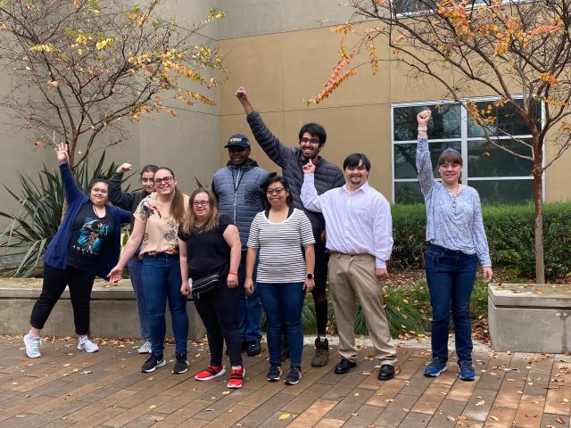SEED scholars on campus, cheering